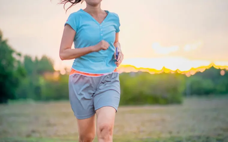 A woman running outdoors