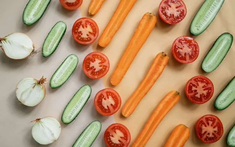 Fresh carrots, tomatoes and cucumbers